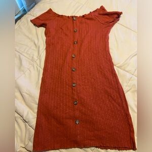 Woman’s orange dress